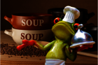 Auf dem Bild ist ein keramik Frosch zu sehen mit einer Kochmütze auf