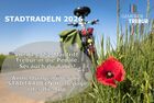 Das Bild zeigt Werbung für das Stadtradeln. Im Hintergrund ist ein Fahrrad zu sehen, dass am Feldrand steht. Im Vordergrund eine Mohnblume. Text in der Pressemitteilung.